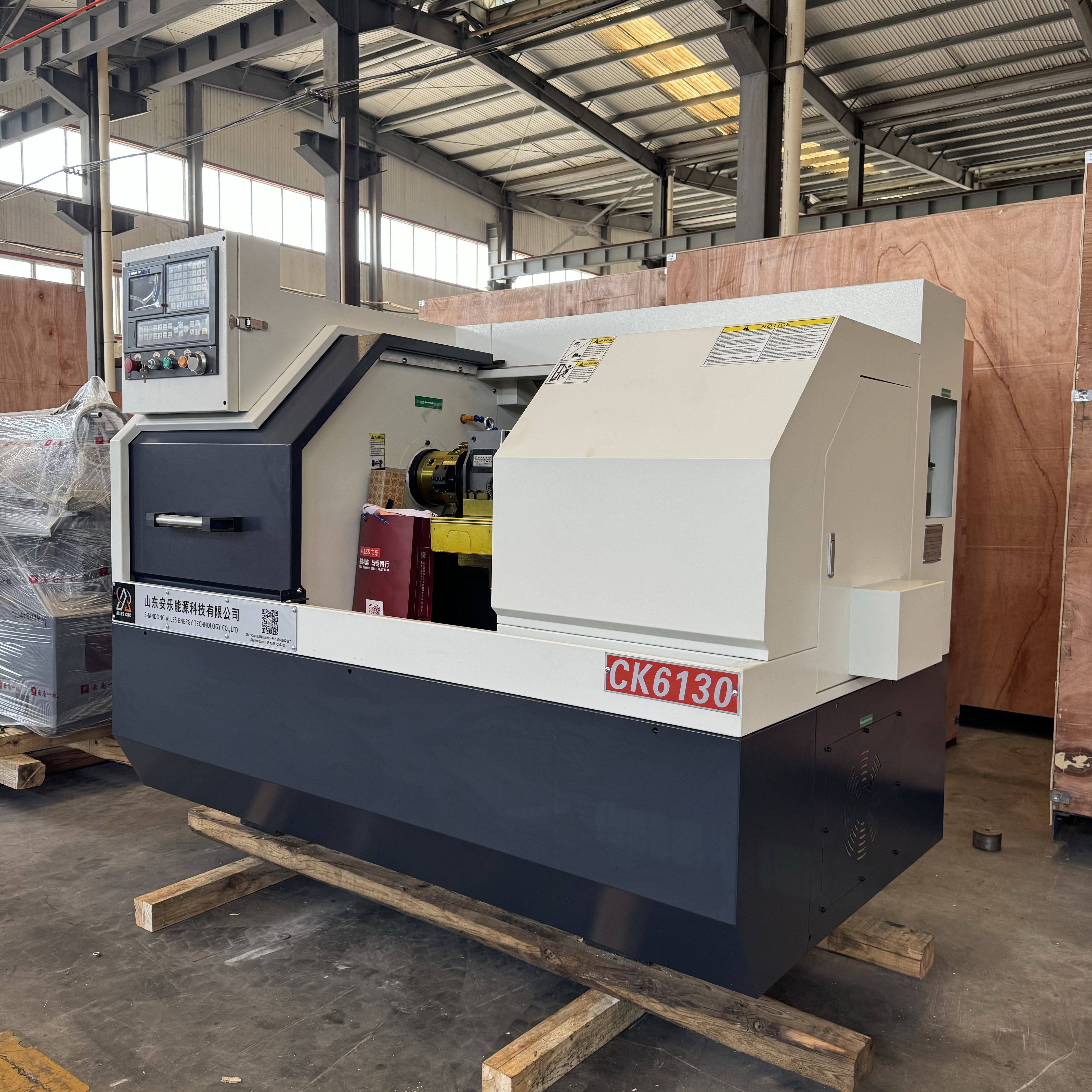 Tornos CNC ALCK6130 embalados y enviados con &eacute;xito al mercado ruso